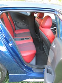 Plenty of leg room, but not headroom, for two rear passengers in the Hyundai Veloster.
