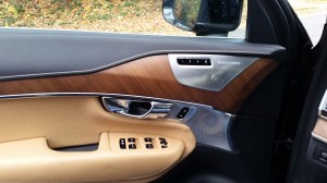 Volvo XC 90 features Walnut wood inlay and Aluminum accents along with a Bowers & Wilkins Premium Sound system.