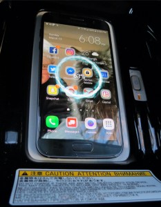 Toyota's Qi-compatible wireless smartphone charger is right where you would put your phone.