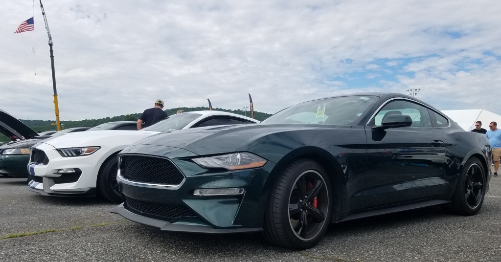 Bullitt MP002 at American Muscle Mustang Show 2019 with US Flag in the air