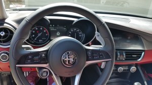 Alfa Romeo Giulia dash and column-mounted shift levers for the 8-speed automatic transmission.