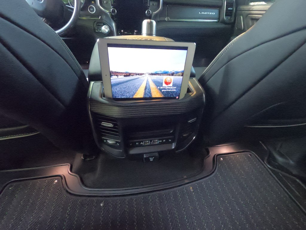 Ram 1500 center console holds an ipad with the queer4cars youtube channel