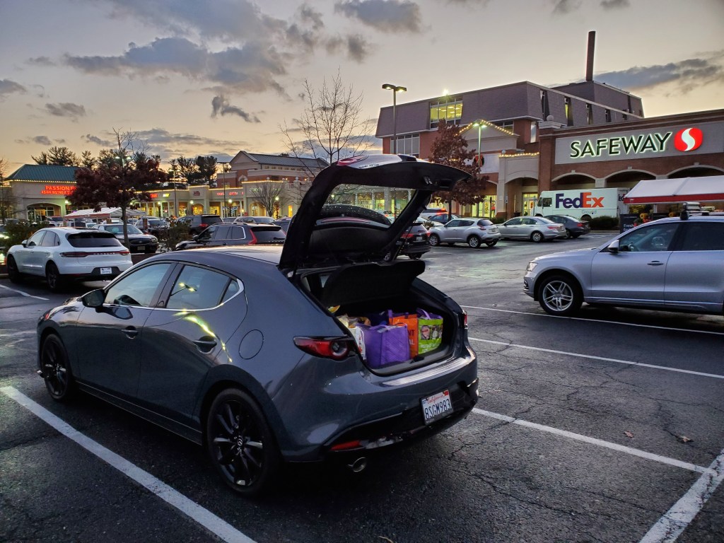 2021 Mazda3 with hatch open at Safeway store