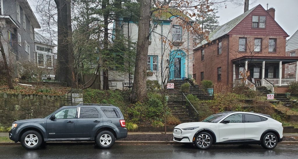 Ford Escape Hybrid and Mustang Mache parked in front of homes in Washington DC