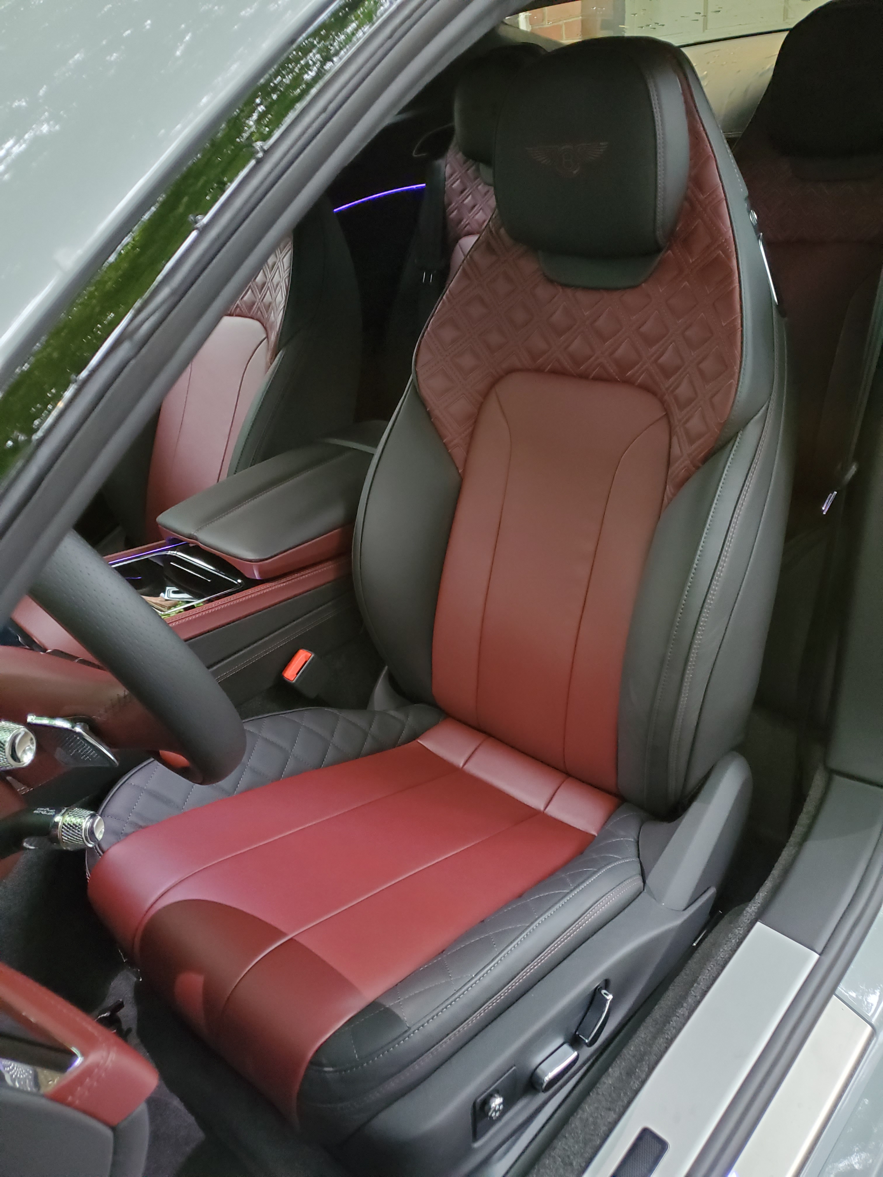 red and brown colored hyde leather seats in the Bentley Continental GT
