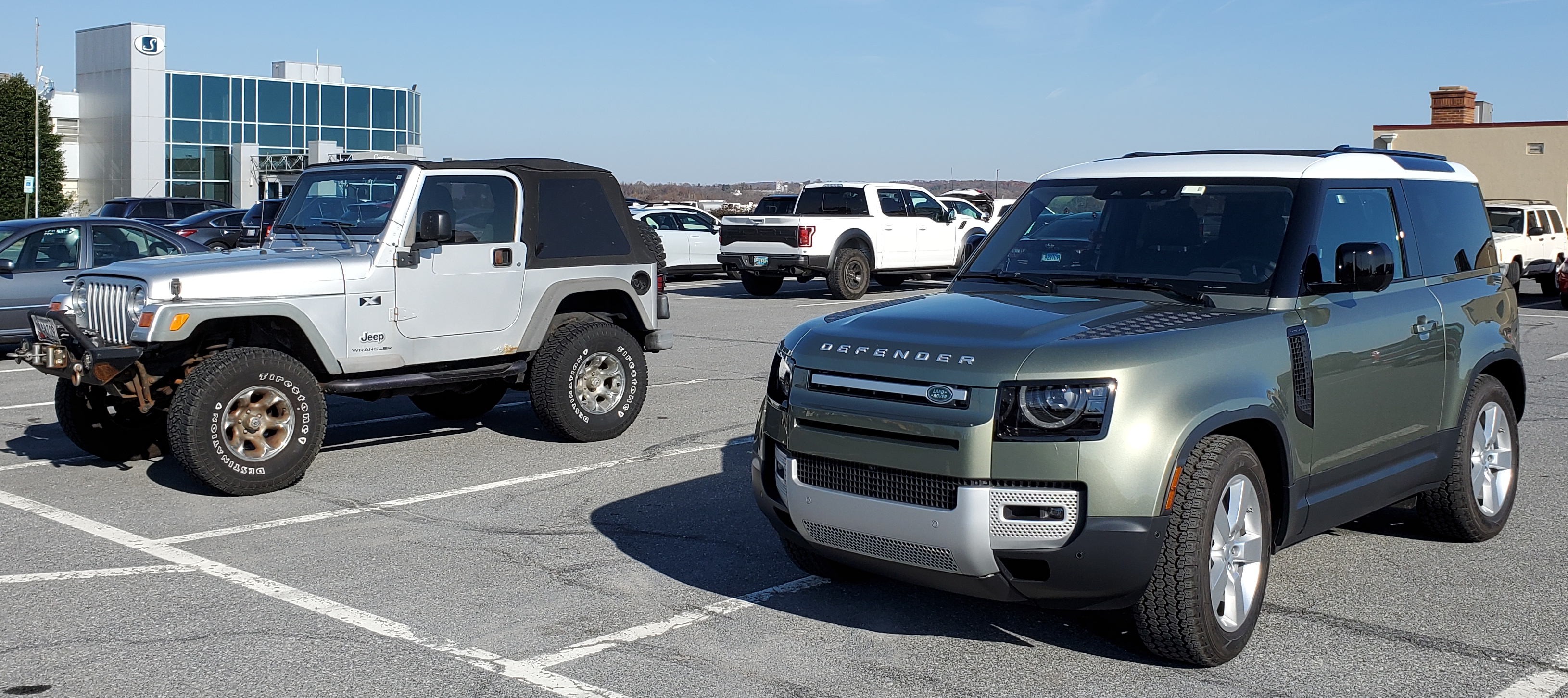 A lifted Jeep CJ and the land rover Defender 90 