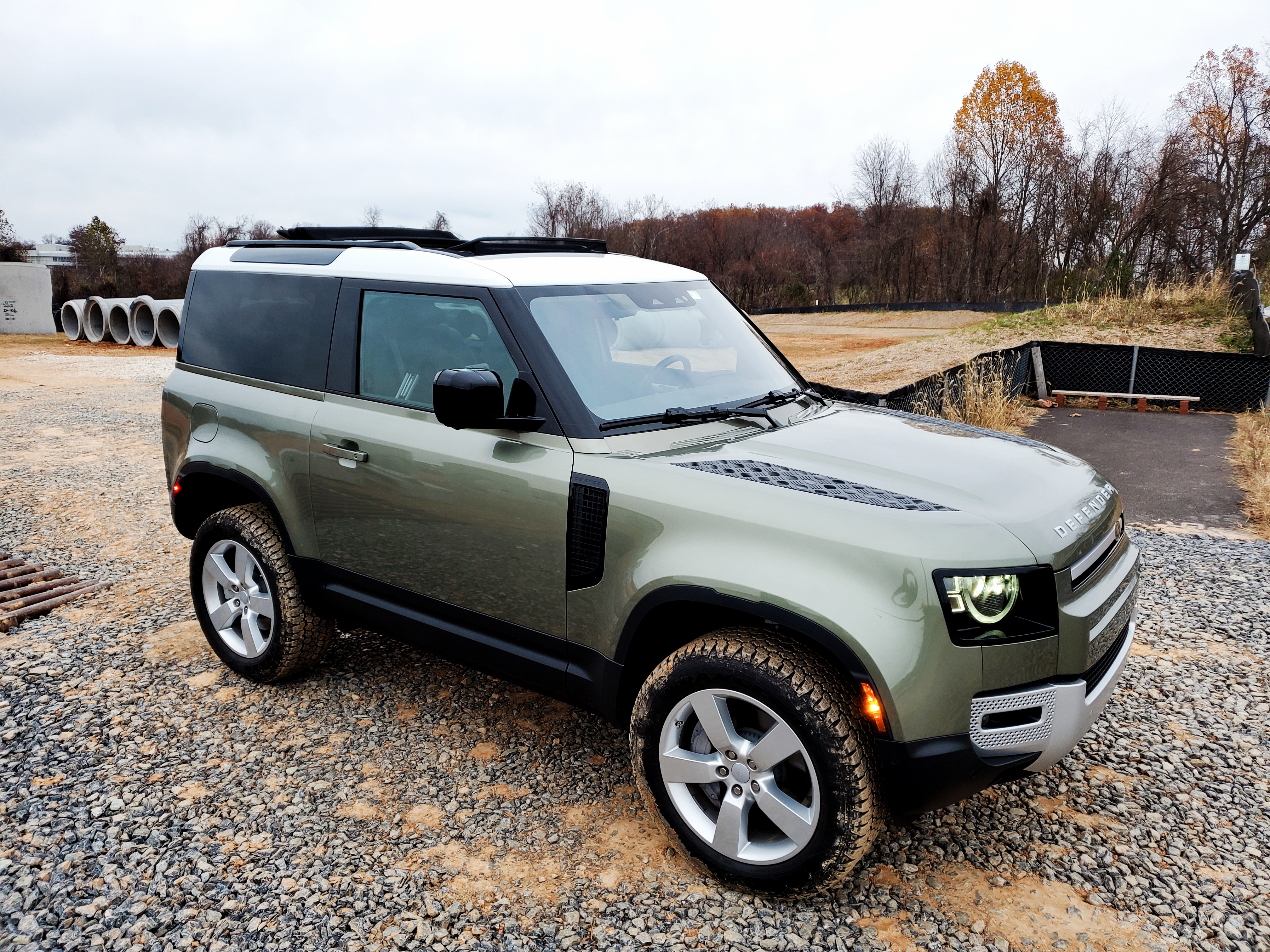land rover defender 90 on a gravel road
