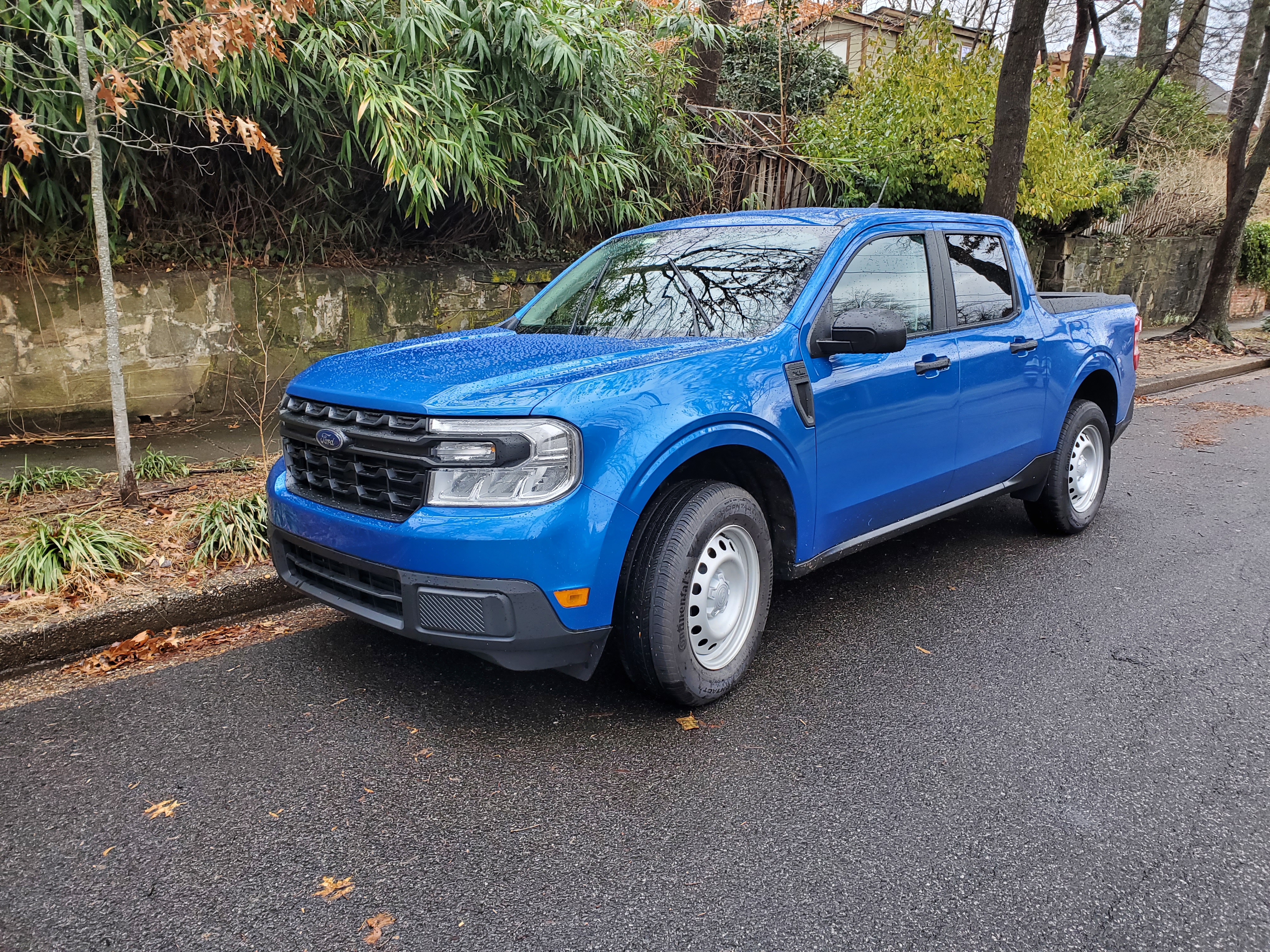 Velocity Blue Metallic Ford Maverick XL. A $21,490 car-based pickup truck with a hybrid engine and front-wheel drive.