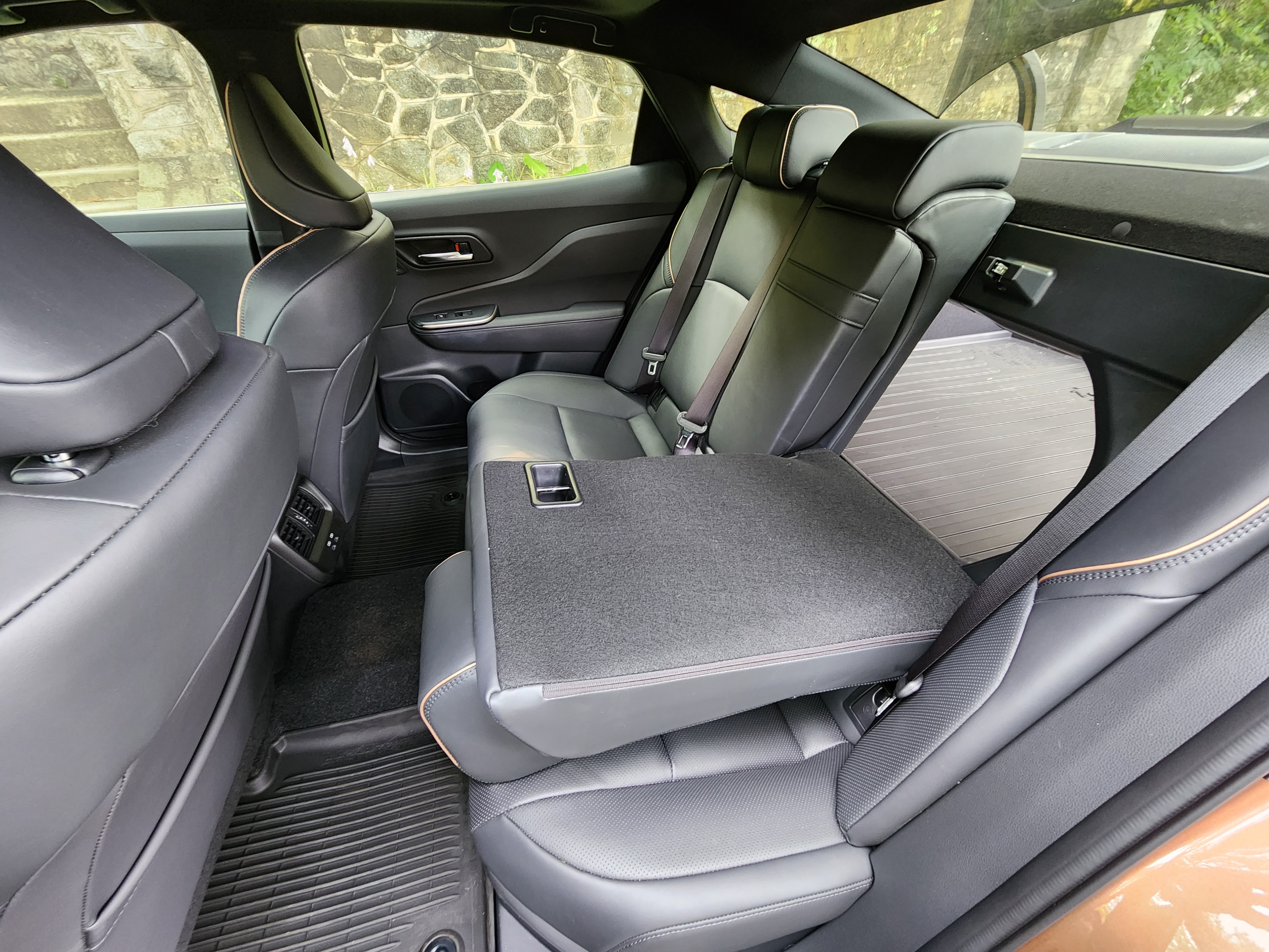 back seat of the toyota crown with the left seat folded down